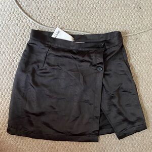 Black satin mini skirt with slit